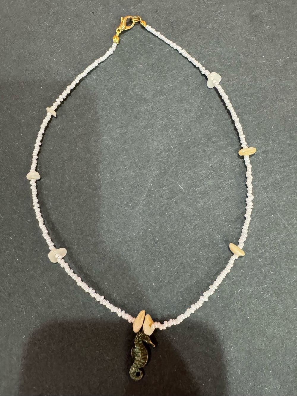 Handcrafted white Beaded Necklace with Seahorse Pendant